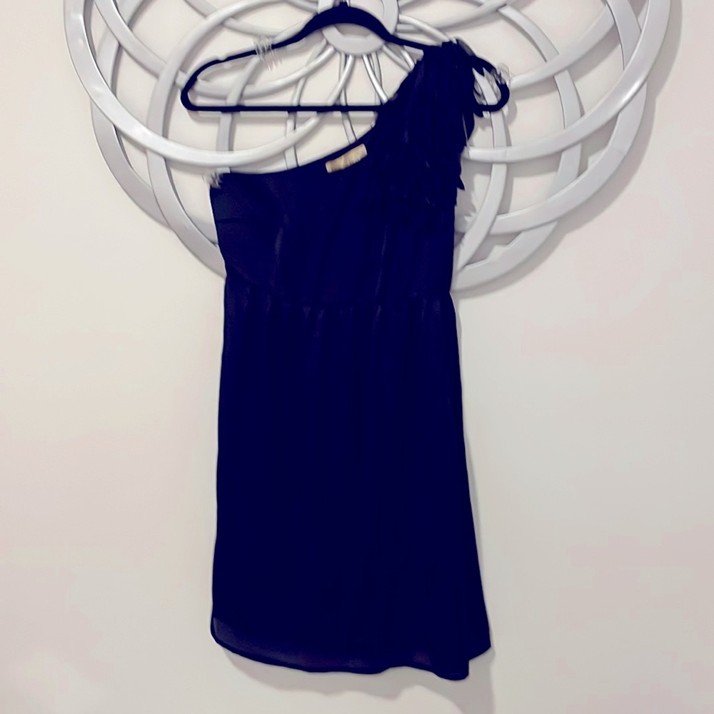 Flirty LBD with fun shoulder detail.